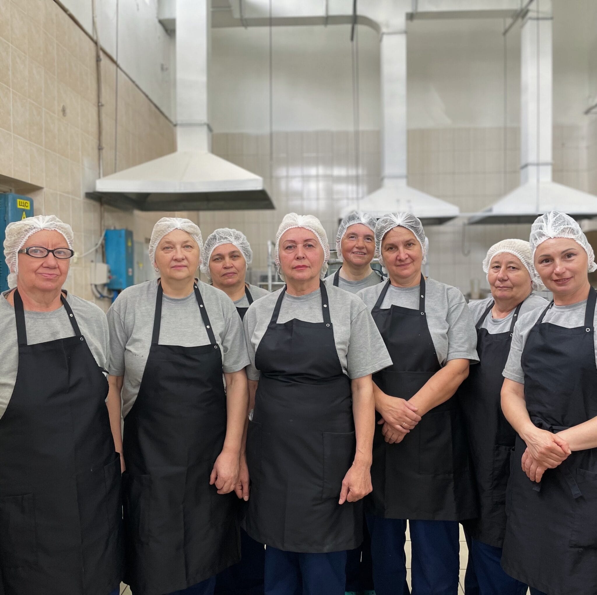 Foodicine kitchen workers wearing Lindström workwear