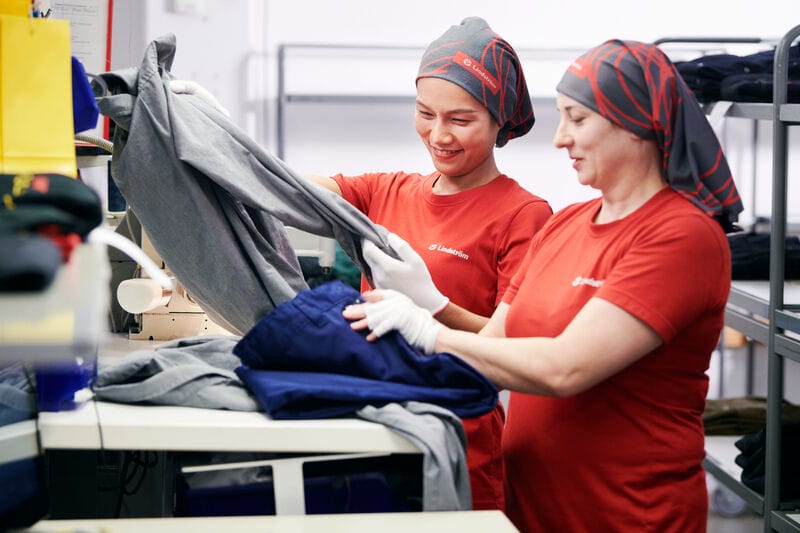 Working in an industrial laundry.