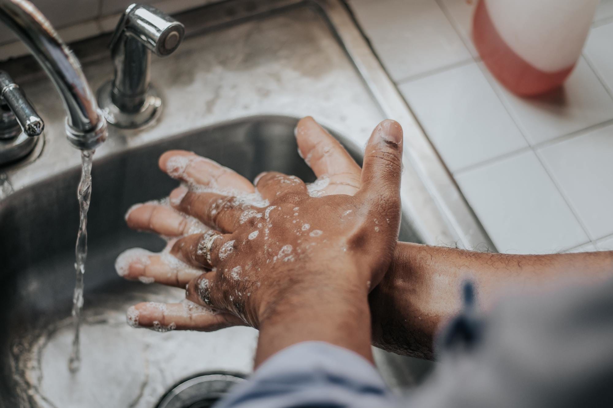 Person Washing Their Hands